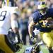 Michigan running back Thomas Rawls runs the ball in the third quarter at Michigan Stadium. Melanie Maxwell I AnnArbor.com